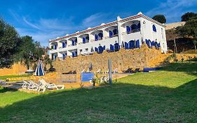 Dmina House